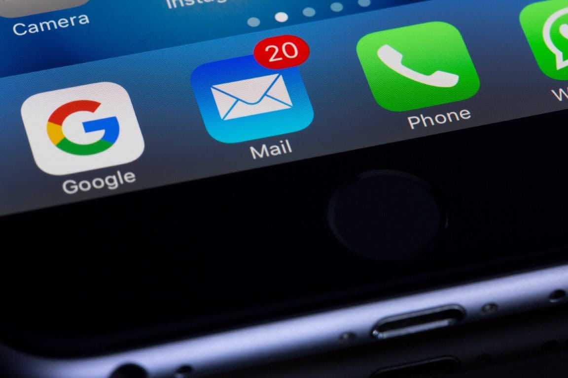 Zoomed in view of smartphone screen showing Google, Mail and Phone apps, with 20 unread messages in the Mail app.